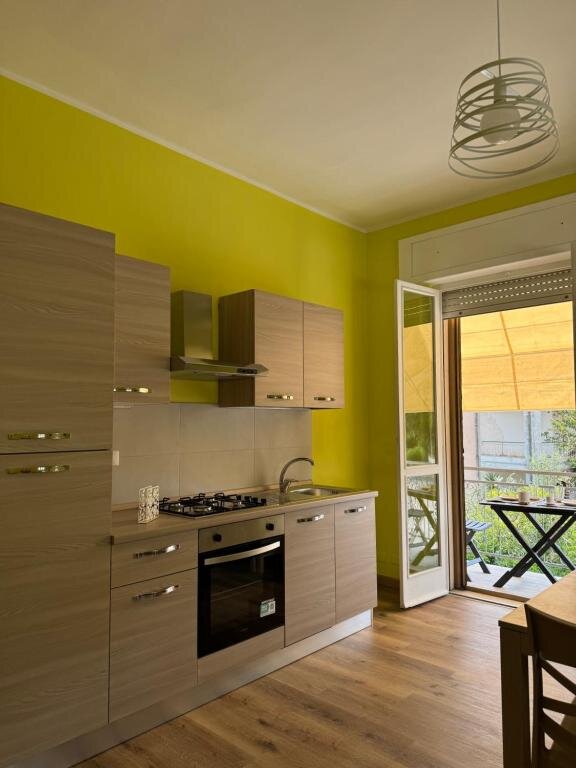 Full kitchen of the Monti apartment for long stays